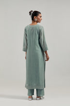Blue silk Chanderi straight kurta set with all-over hand embroidered mirror and silver sequins.