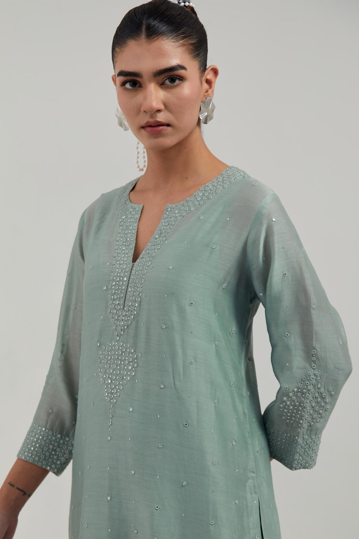 Blue silk Chanderi straight kurta set with all-over hand embroidered mirror and silver sequins.