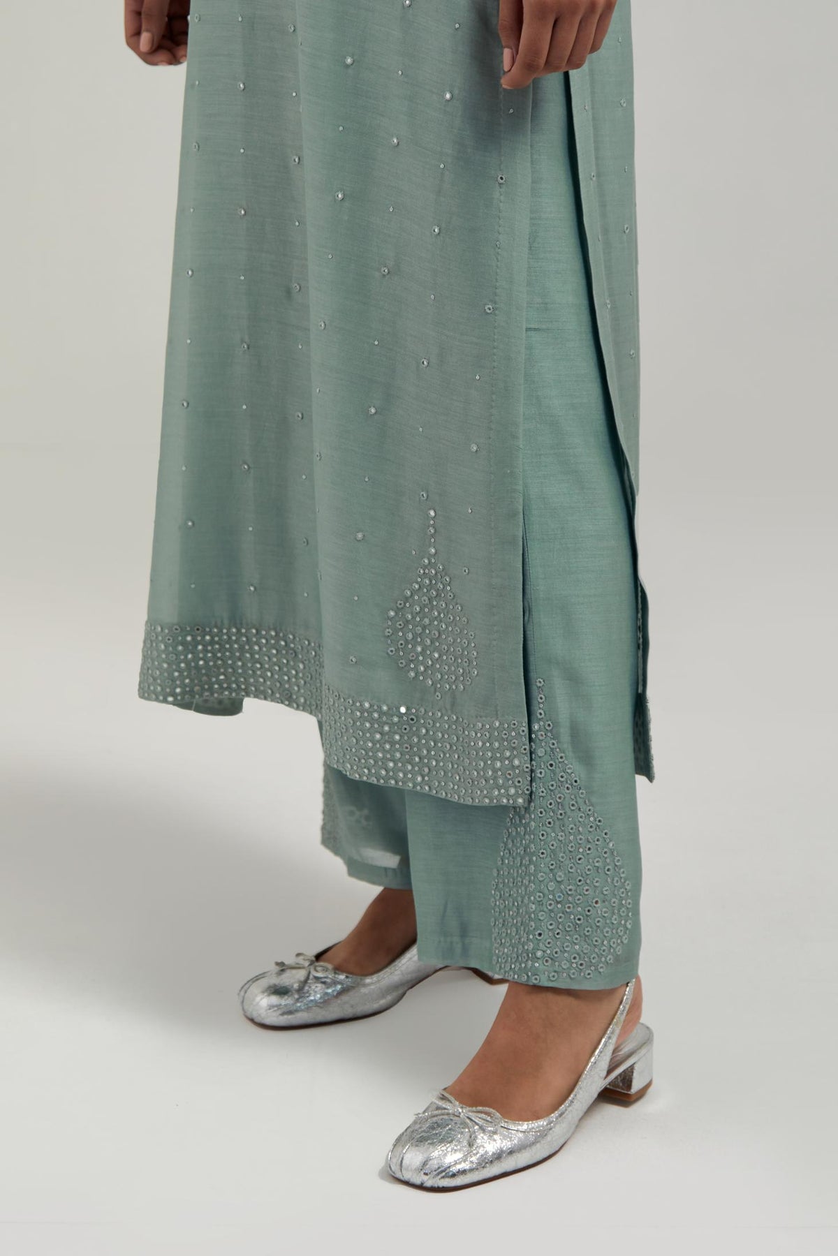 Blue silk Chanderi straight kurta set with all-over hand embroidered mirror and silver sequins.