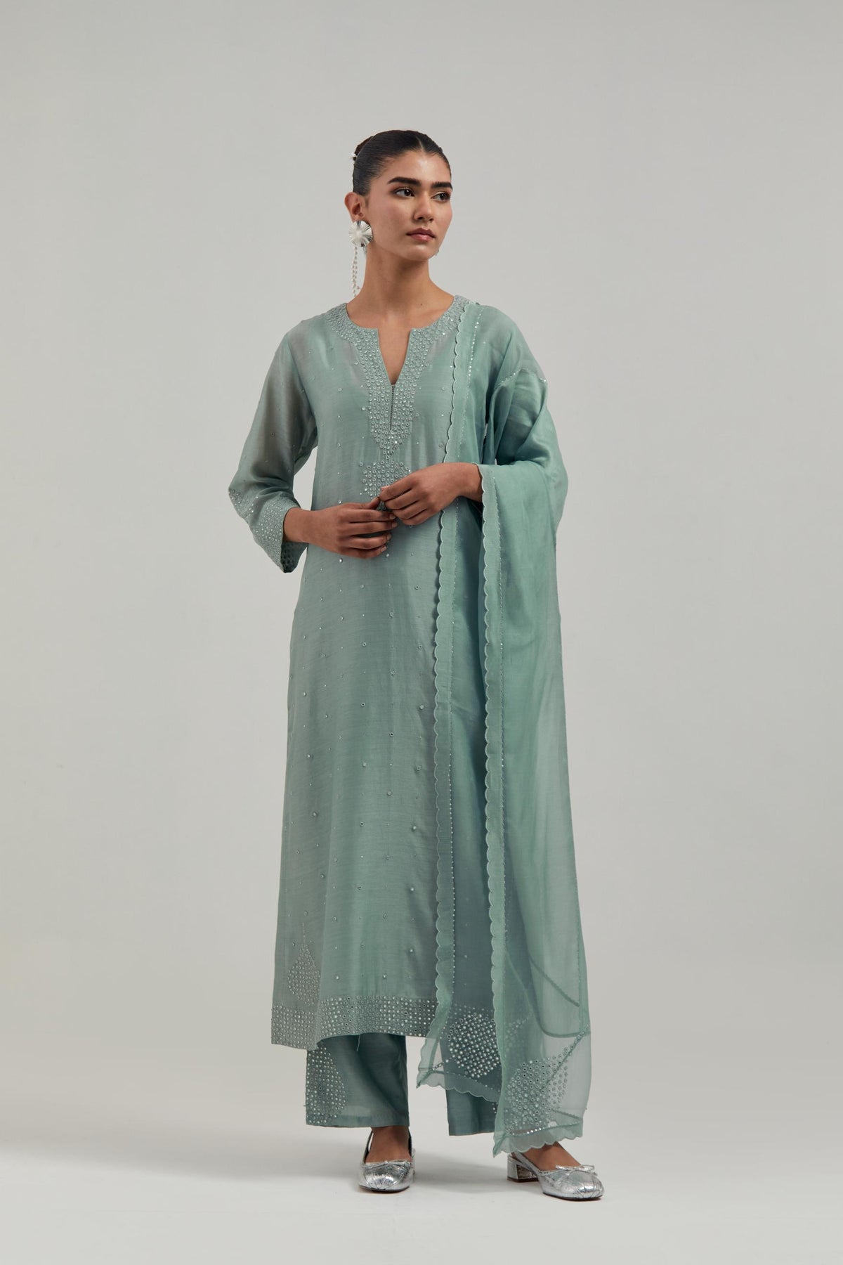 Blue silk Chanderi dupatta with silk organza at the sides, finished with delicate scalloped edges, highlighted by hand-embroidered mirror & sequins work.