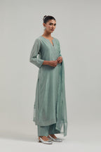 Blue silk Chanderi straight kurta set with all-over hand embroidered mirror and silver sequins.