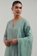 Blue silk Chanderi dupatta with silk organza at the sides, finished with delicate scalloped edges, highlighted by hand-embroidered mirror & sequins work.