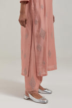 Peach Silk Chanderi straight kurta set with hand embroidered diamond motifs with delicate mirror and sequins work all-over the kurta.