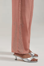 Peach silk Chanderi pants with hand-embroidered paisley motifs with delicate mirror and sequins work at the hem.