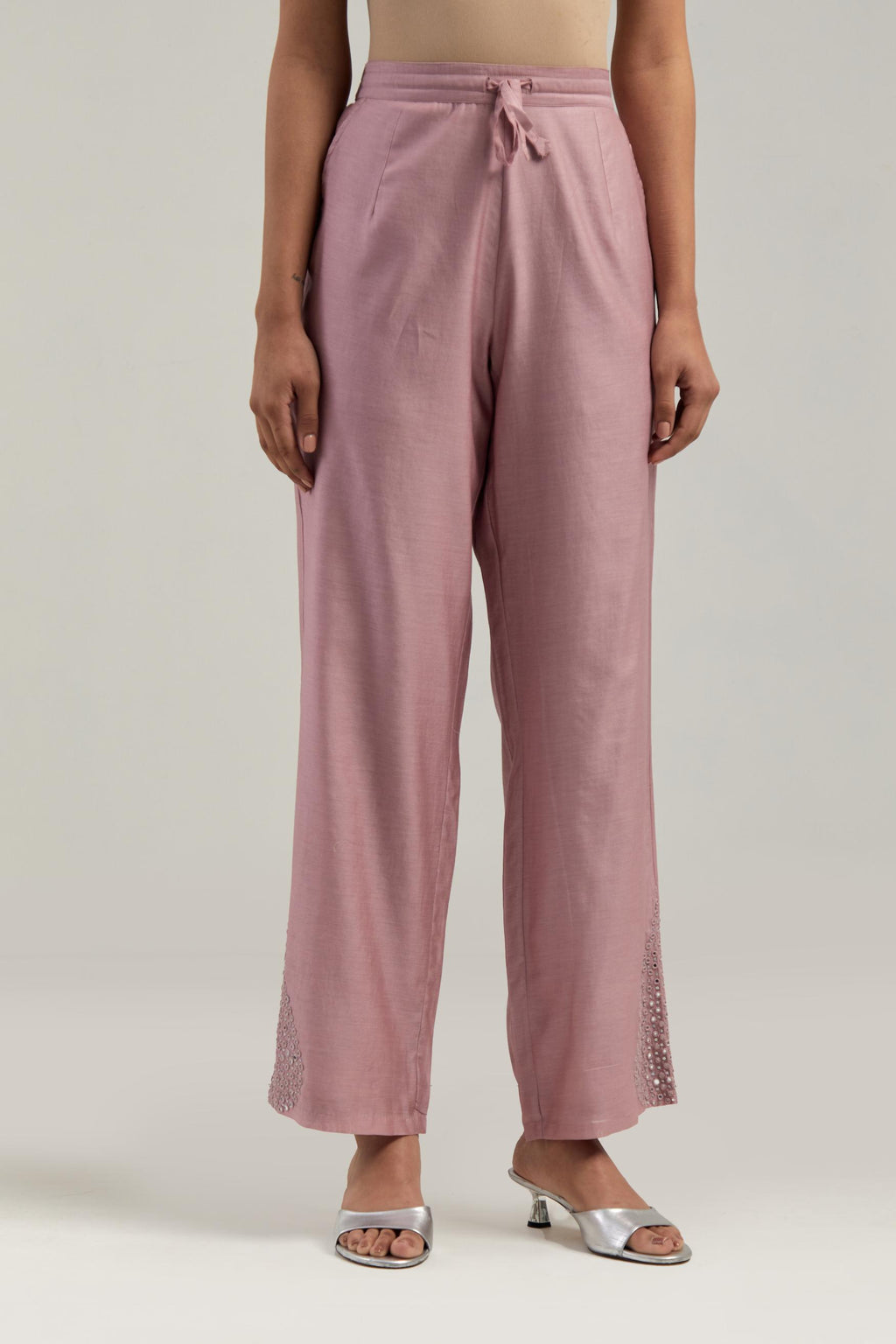 Pink Silk Chanderi pants with hand embroidered leaf motifs with delicate mirror & sequins work at hem.