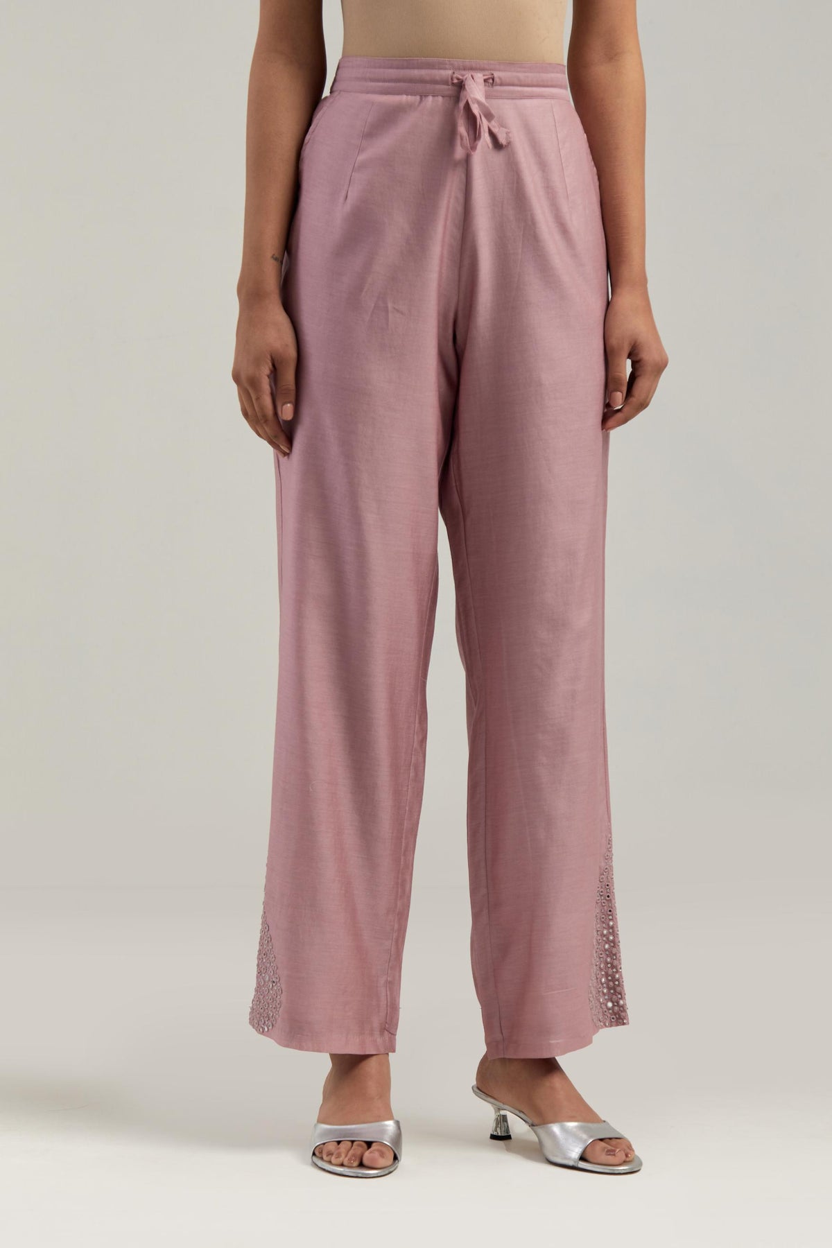 Pink Silk Chanderi pants with hand embroidered leaf motifs with delicate mirror & sequins work at hem.