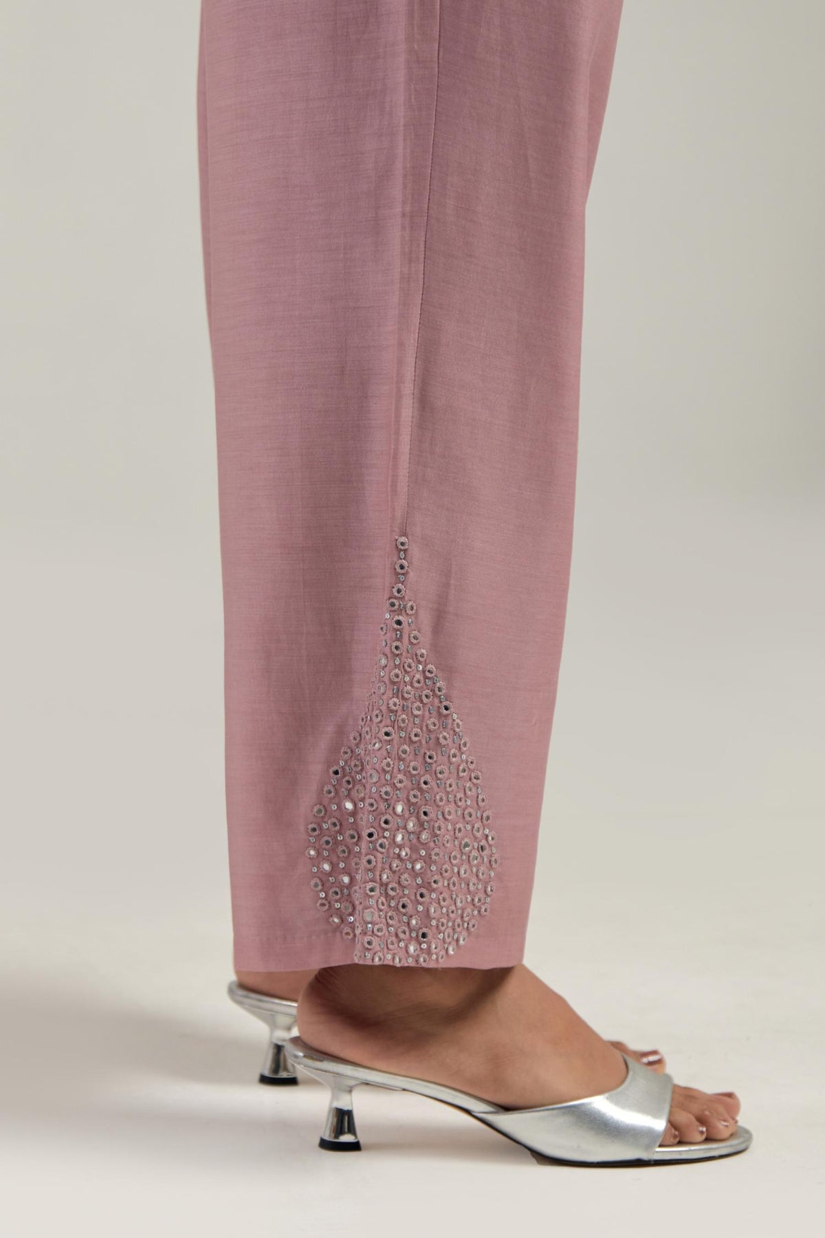 Pink Silk Chanderi pants with hand embroidered leaf motifs with delicate mirror & sequins work at hem.