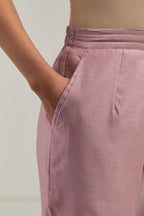 Pink Silk Chanderi pants with hand embroidered leaf motifs with delicate mirror & sequins work at hem.