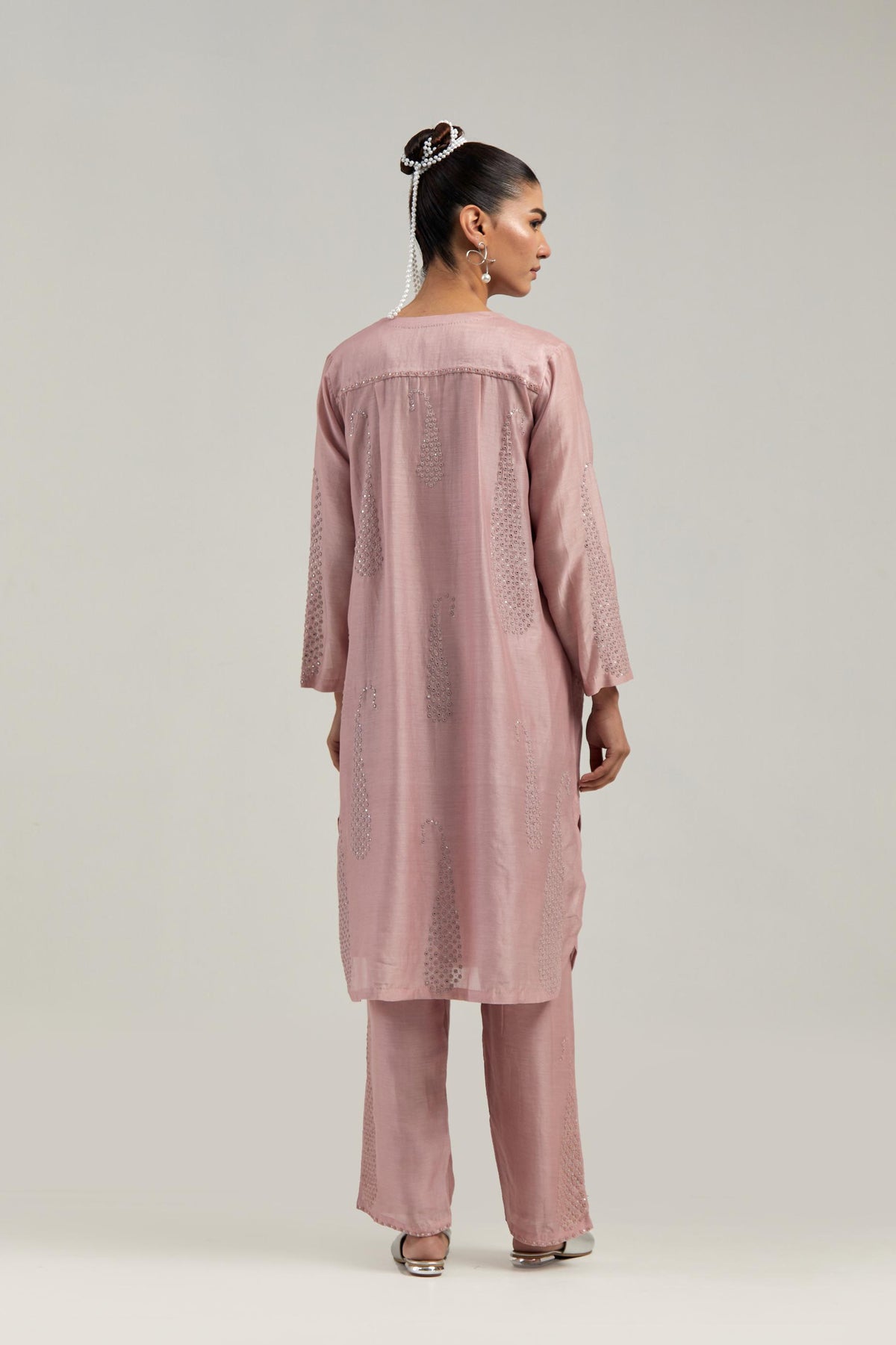 Pink Silk Chanderi short kurta set with hand-embroidered paisley motifs with delicate mirror and sequins work all-over the kurta.