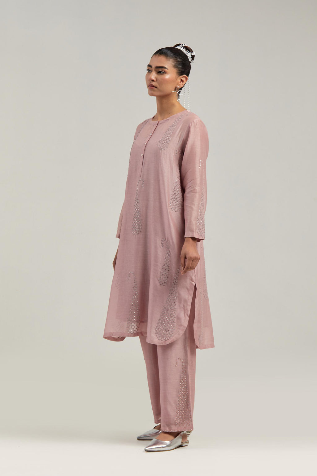 Pink Silk Chanderi short kurta set with hand-embroidered paisley motifs with delicate mirror and sequins work all-over the kurta.