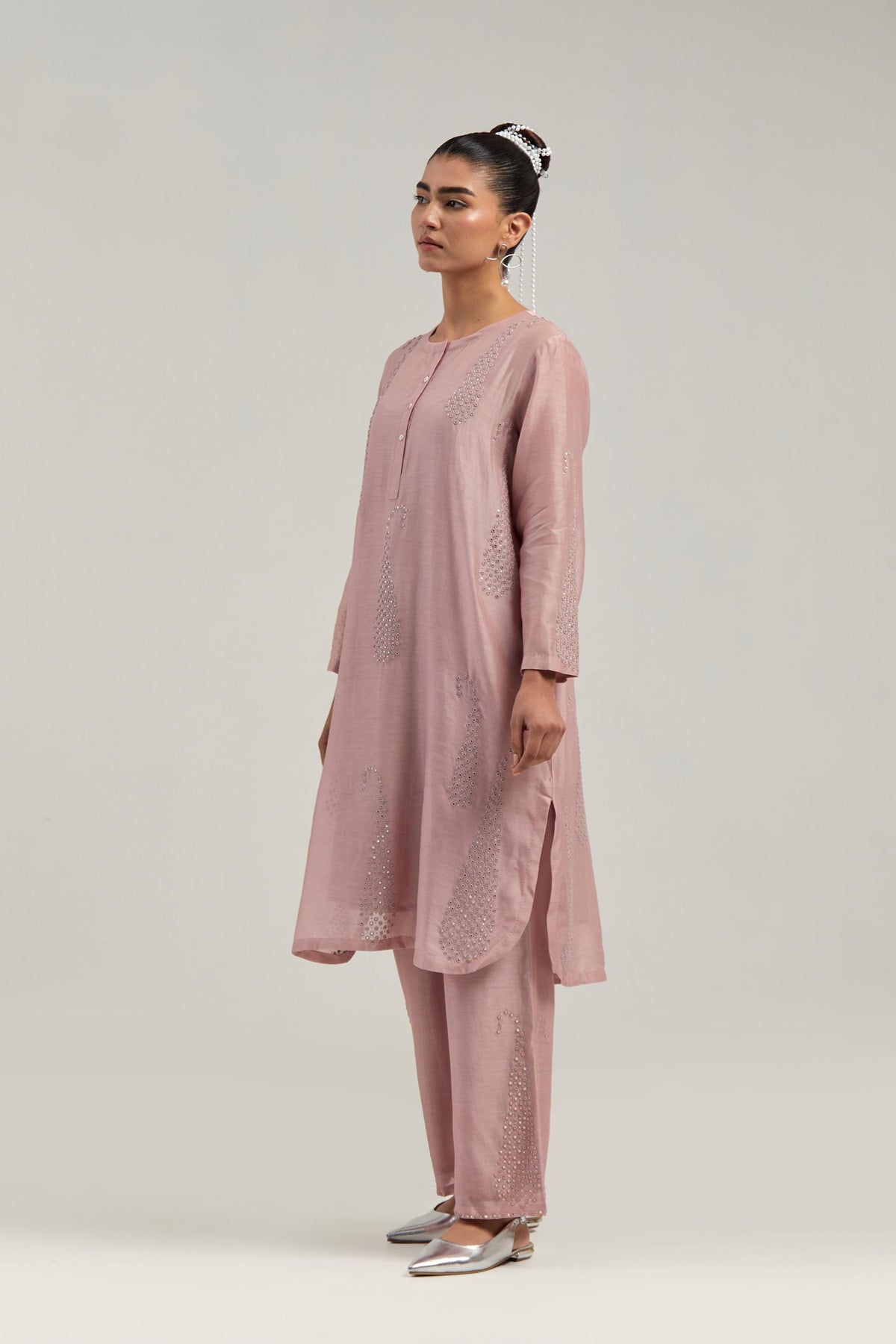 Pink Silk Chanderi short kurta set with hand-embroidered paisley motifs with delicate mirror and sequins work all-over the kurta.