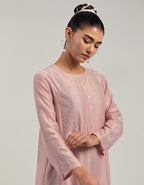 Pink Silk Chanderi short kurta set with hand-embroidered paisley motifs with delicate mirror and sequins work all-over the kurta.
