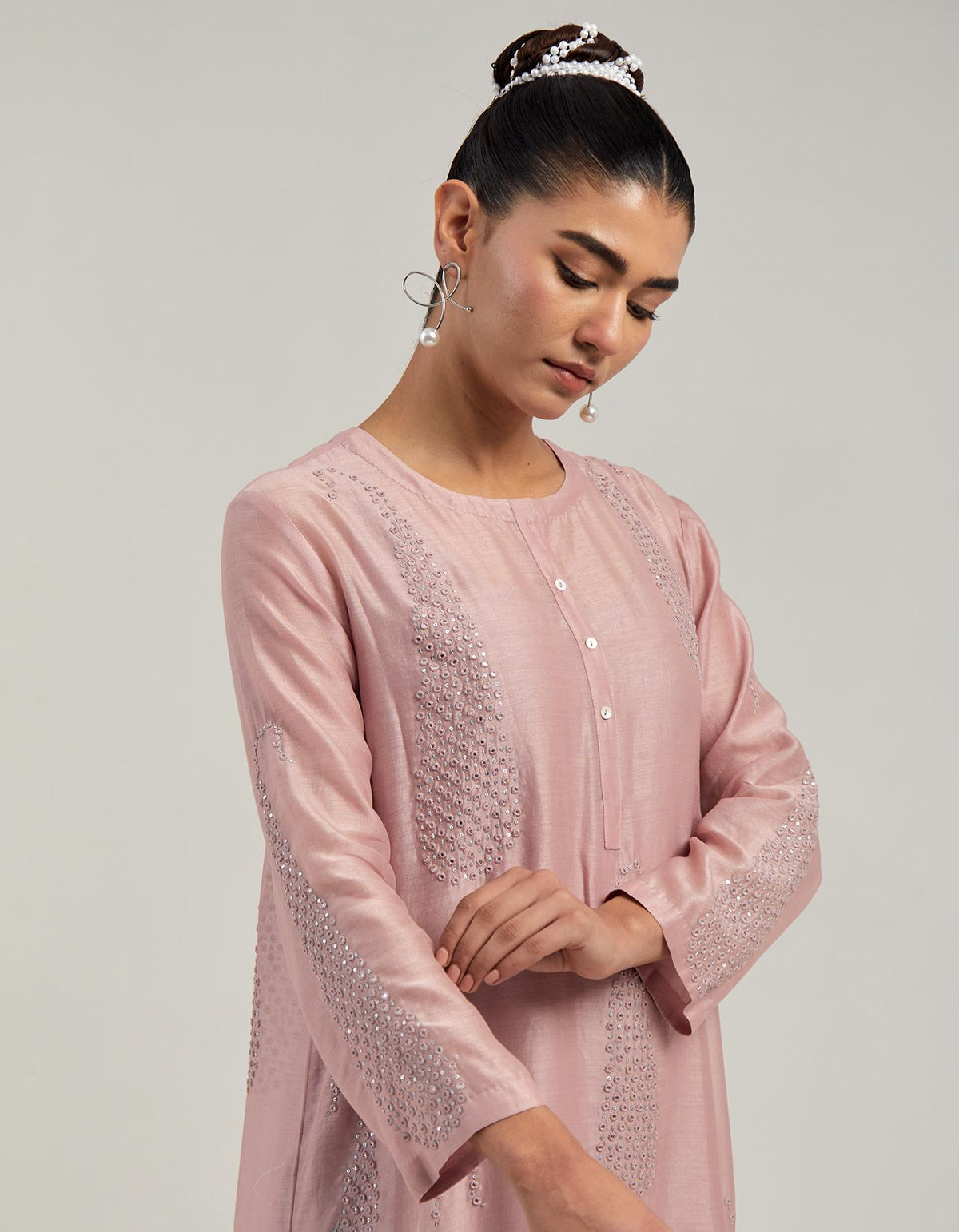 Pink Silk Chanderi short kurta set with hand-embroidered paisley motifs with delicate mirror and sequins work all-over the kurta.