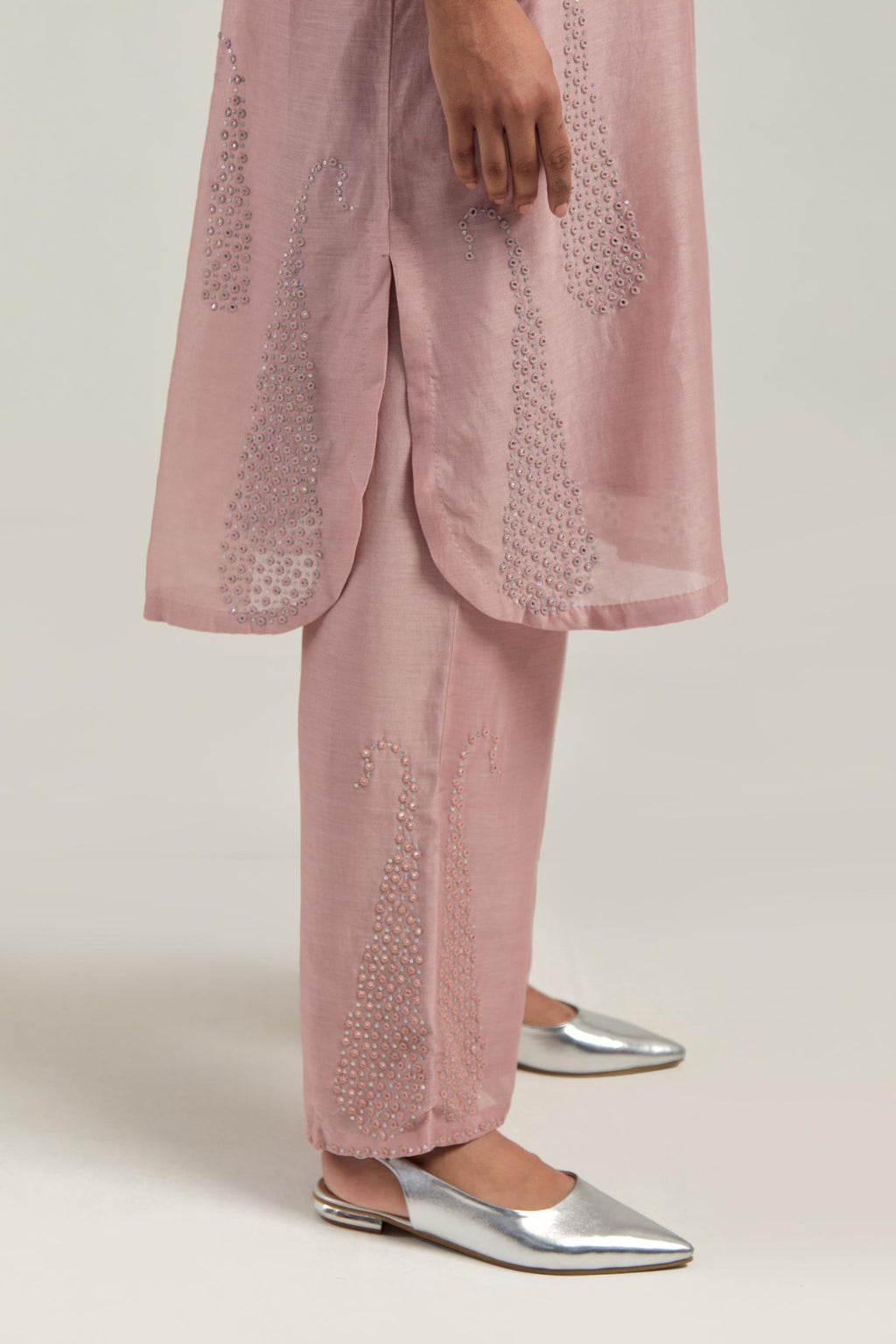 Pink Silk Chanderi short kurta set with hand-embroidered paisley motifs with delicate mirror and sequins work all-over the kurta.