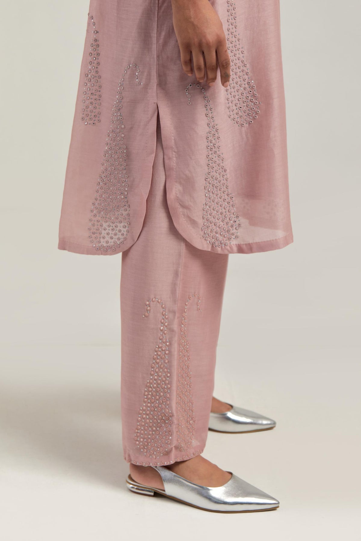 Pink Silk Chanderi short kurta set with hand-embroidered paisley motifs with delicate mirror and sequins work all-over the kurta.