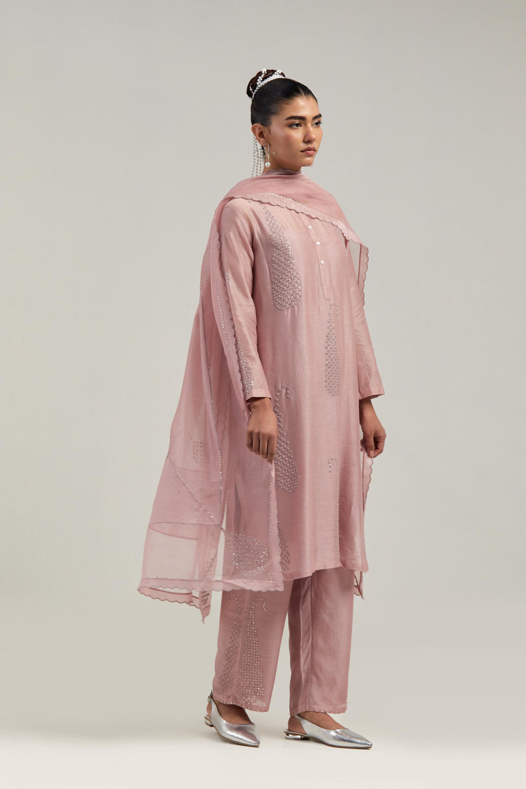 Pink Silk Chanderi short kurta set with hand-embroidered paisley motifs with delicate mirror and sequins work all-over the kurta.