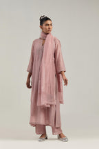 Pink silk Chanderi straight kurta set with hand-embroidered paisley motifs with delicate mirror and sequins work at neck, hem, and sleeves, with narrow borders along the edges.