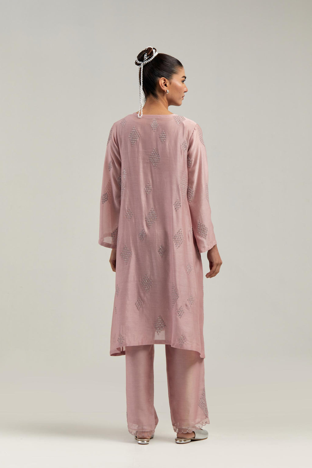 Pink Silk Chanderi A-line short kurta set with hand embroidered diamond motifs with delicate mirror and sequins work all-over the kurta.