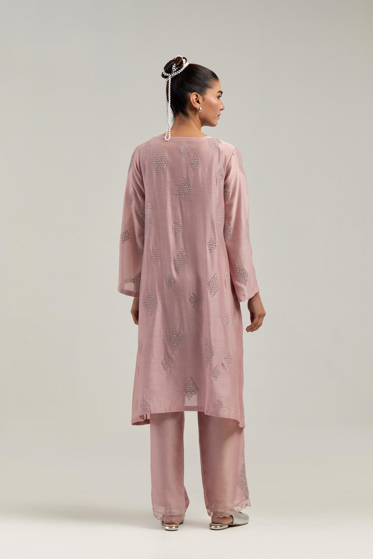 Pink Silk Chanderi A-line short kurta set with hand embroidered diamond motifs with delicate mirror and sequins work all-over the kurta.