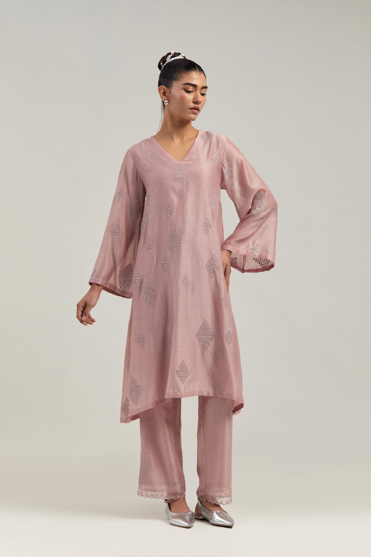 Pink Silk Chanderi A-line short kurta set with hand embroidered diamond motifs with delicate mirror and sequins work all-over the kurta.
