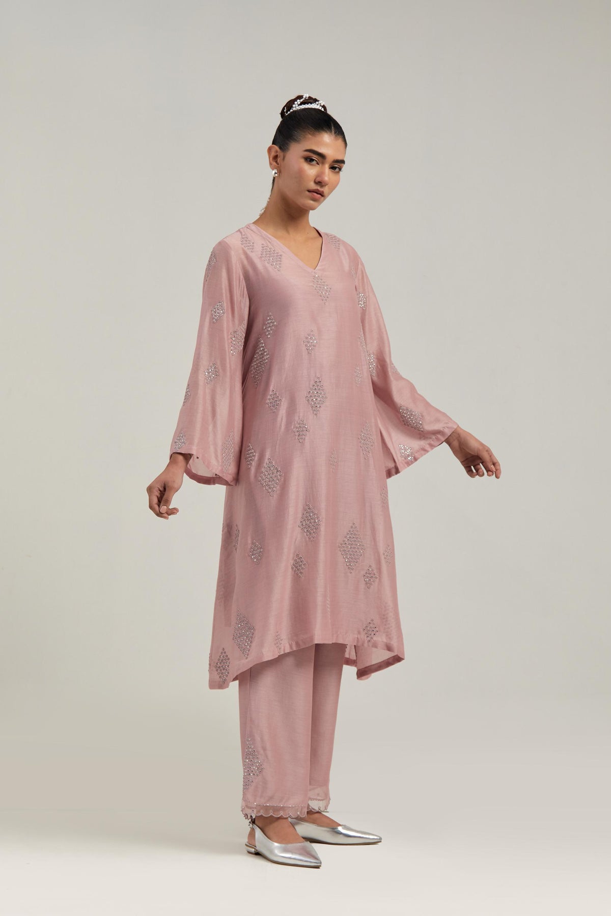 Pink Silk Chanderi A-line short kurta set with hand embroidered diamond motifs with delicate mirror and sequins work all-over the kurta.