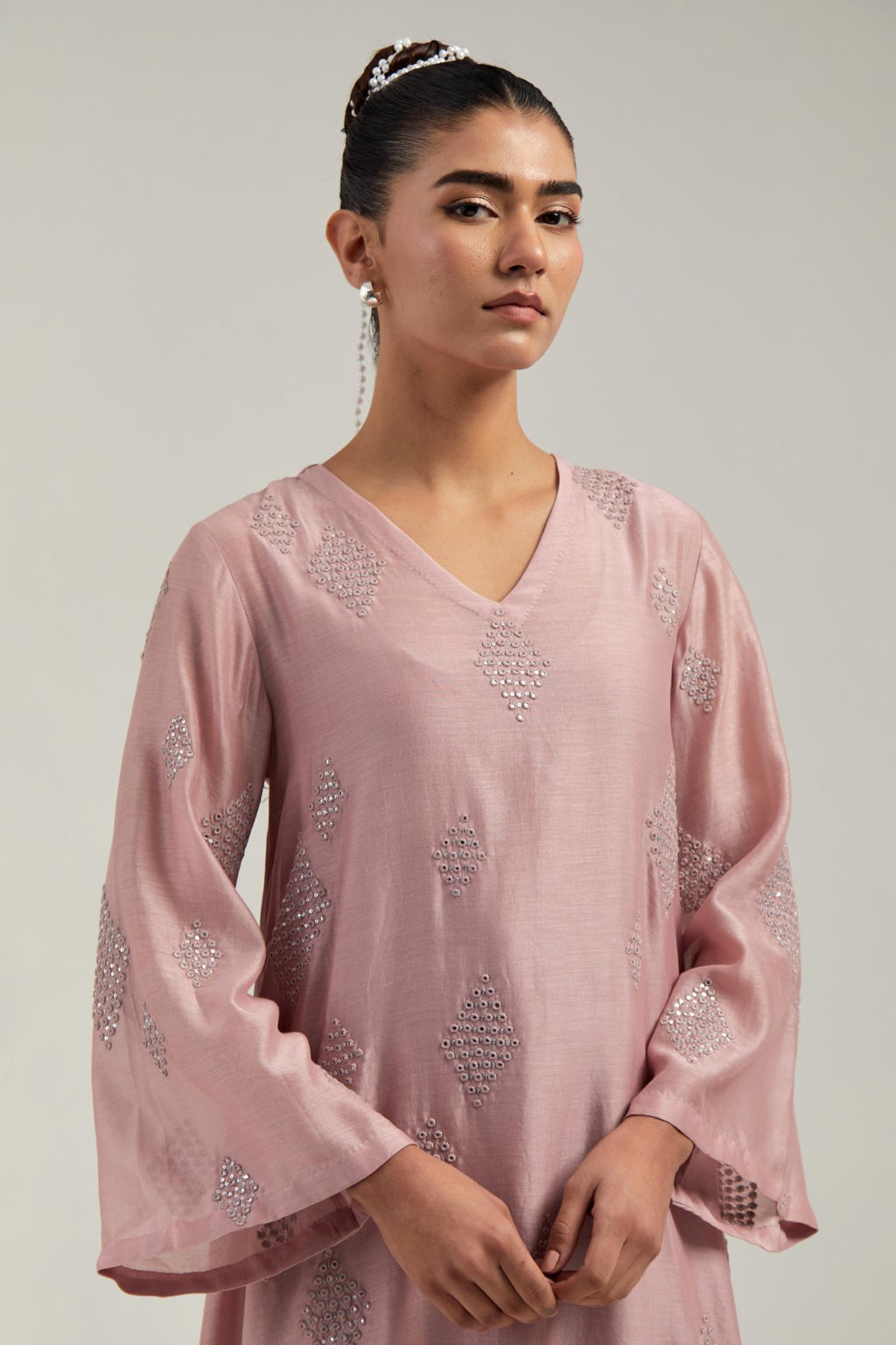 Pink Silk Chanderi A-line short kurta set with hand embroidered diamond motifs with delicate mirror and sequins work all-over the kurta.