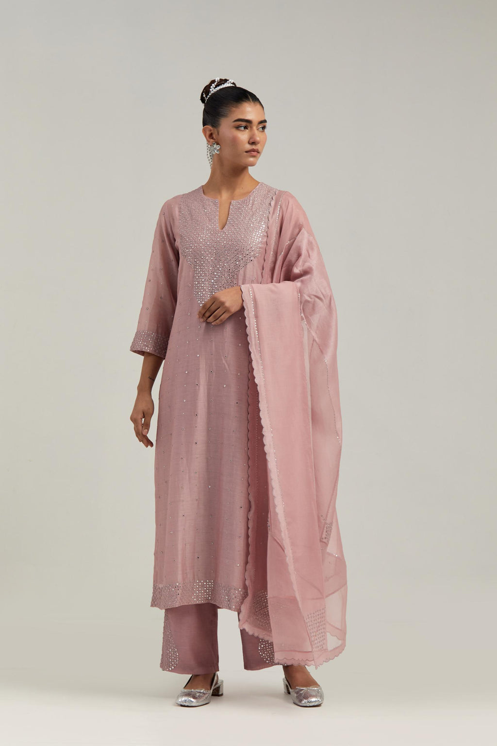 Pink silk Chanderi dupatta with silk organza at the sides, finished with delicate scalloped edges, highlighted by hand-embroidered mirror & sequins work.
