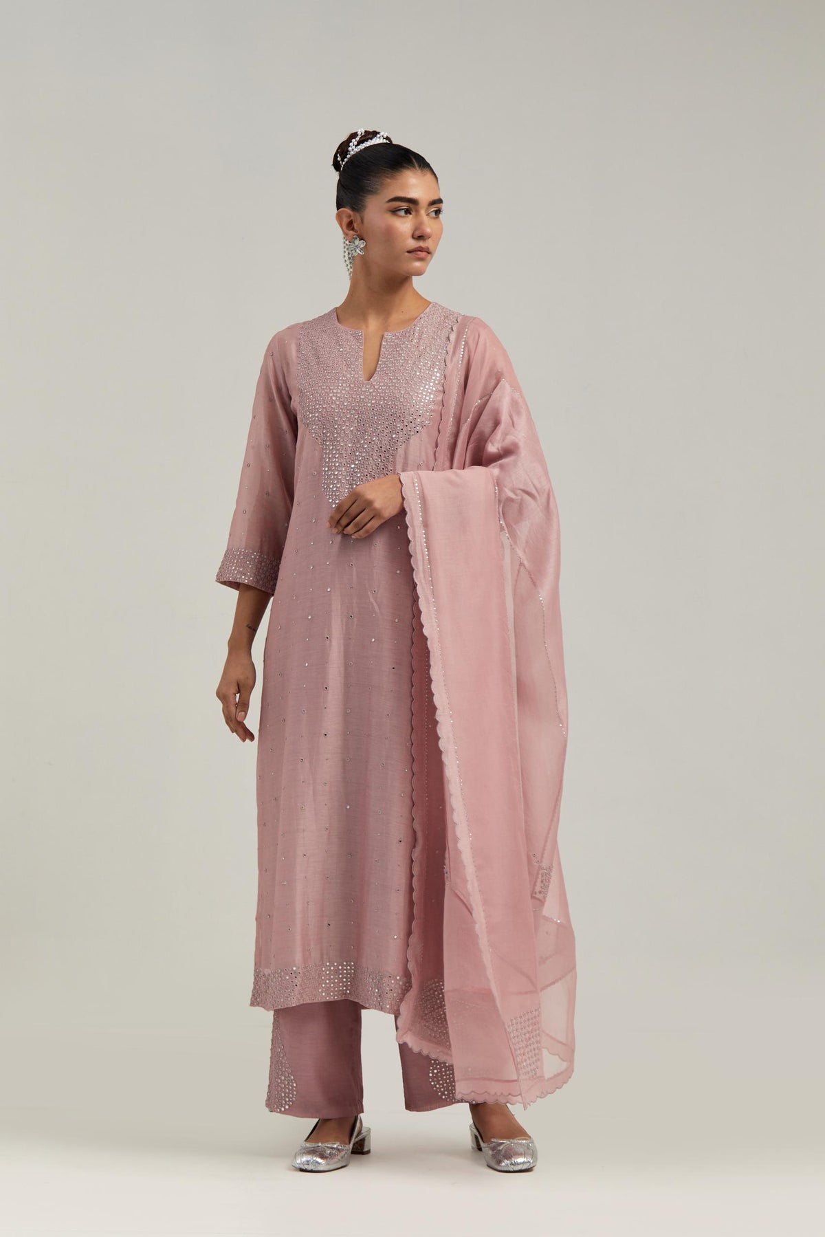 Pink silk Chanderi dupatta with silk organza at the sides, finished with delicate scalloped edges, highlighted by hand-embroidered mirror & sequins work.