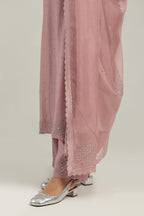 Pink silk Chanderi straight kurta set with hand-embroidered mirror at the neck, hem and sleeves, highlighted with scattered silver sequin and mirror embellishments all-over.