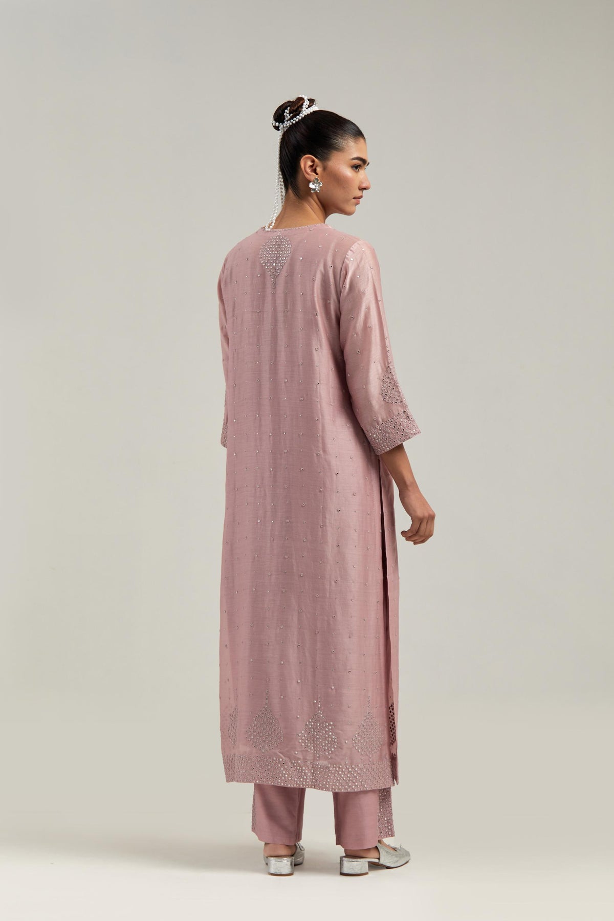 Pink silk Chanderi straight kurta set with hand-embroidered mirror at the neck, borders running along the hem and sleeve edges, and scattered silver sequin and mirror embellishments all-over.