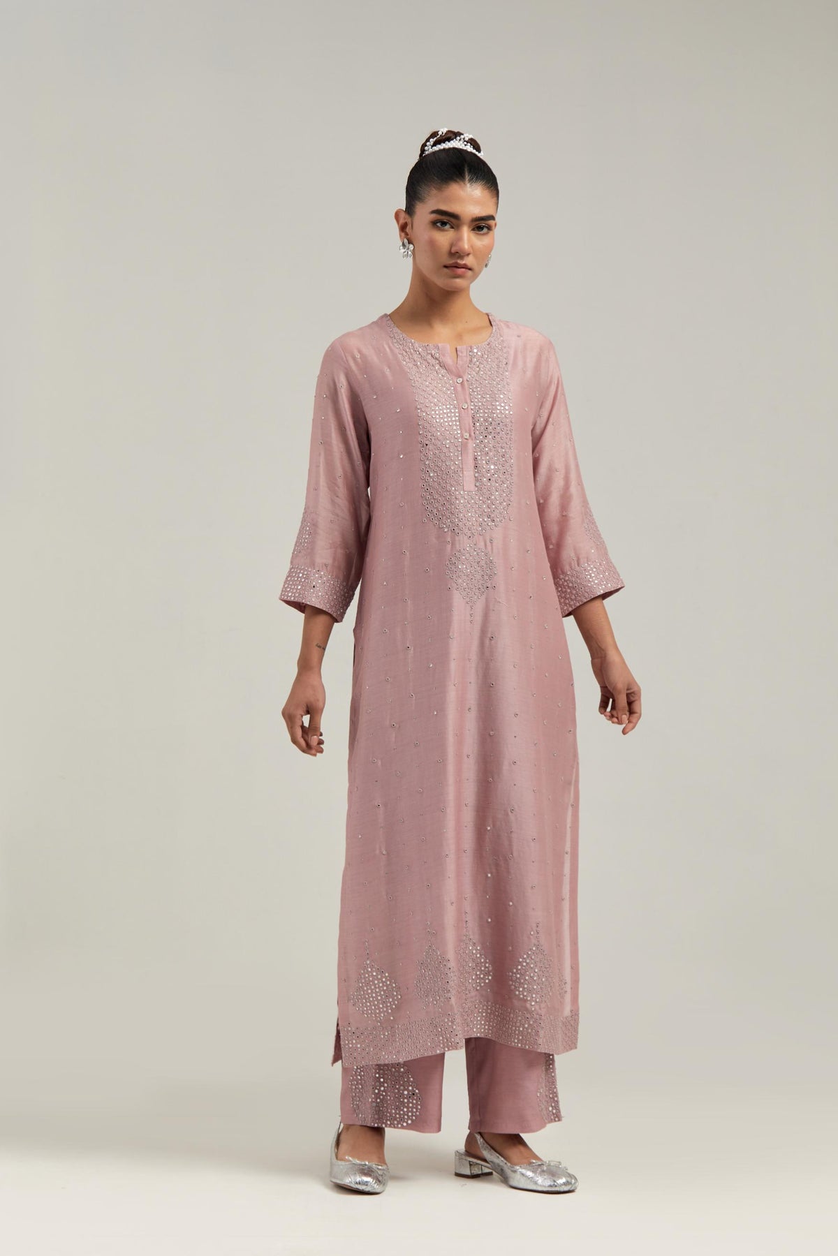 Pink silk Chanderi straight kurta set with hand-embroidered mirror at the neck, borders running along the hem and sleeve edges, and scattered silver sequin and mirror embellishments all-over.