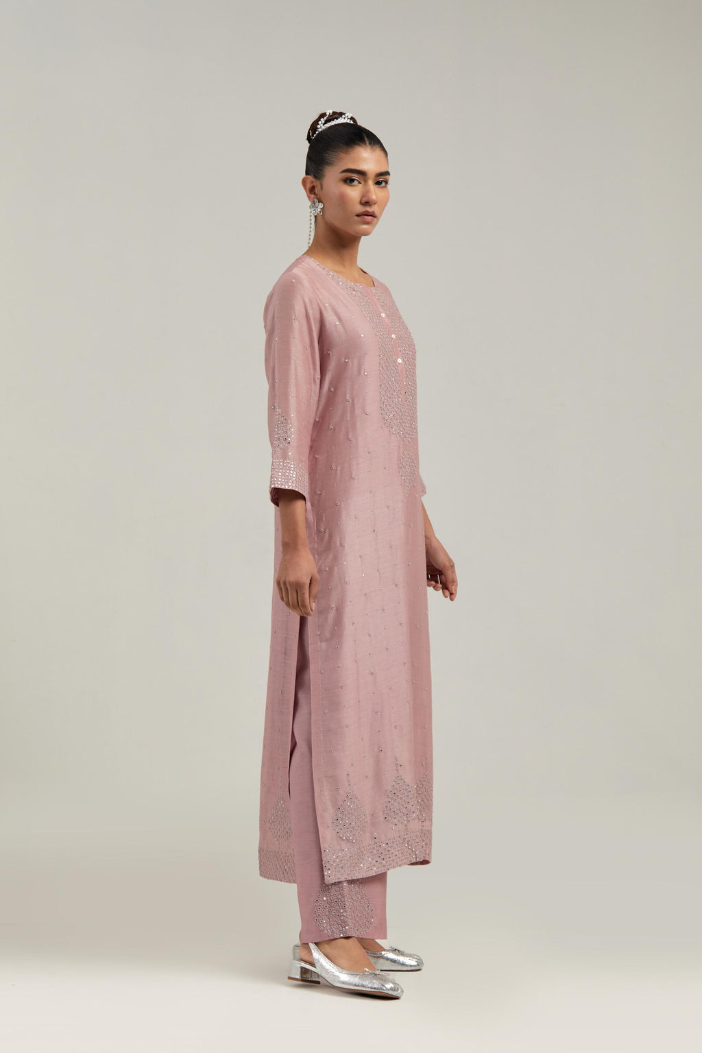 Pink silk Chanderi straight kurta set with hand-embroidered mirror at the neck, borders running along the hem and sleeve edges, and scattered silver sequin and mirror embellishments all-over.