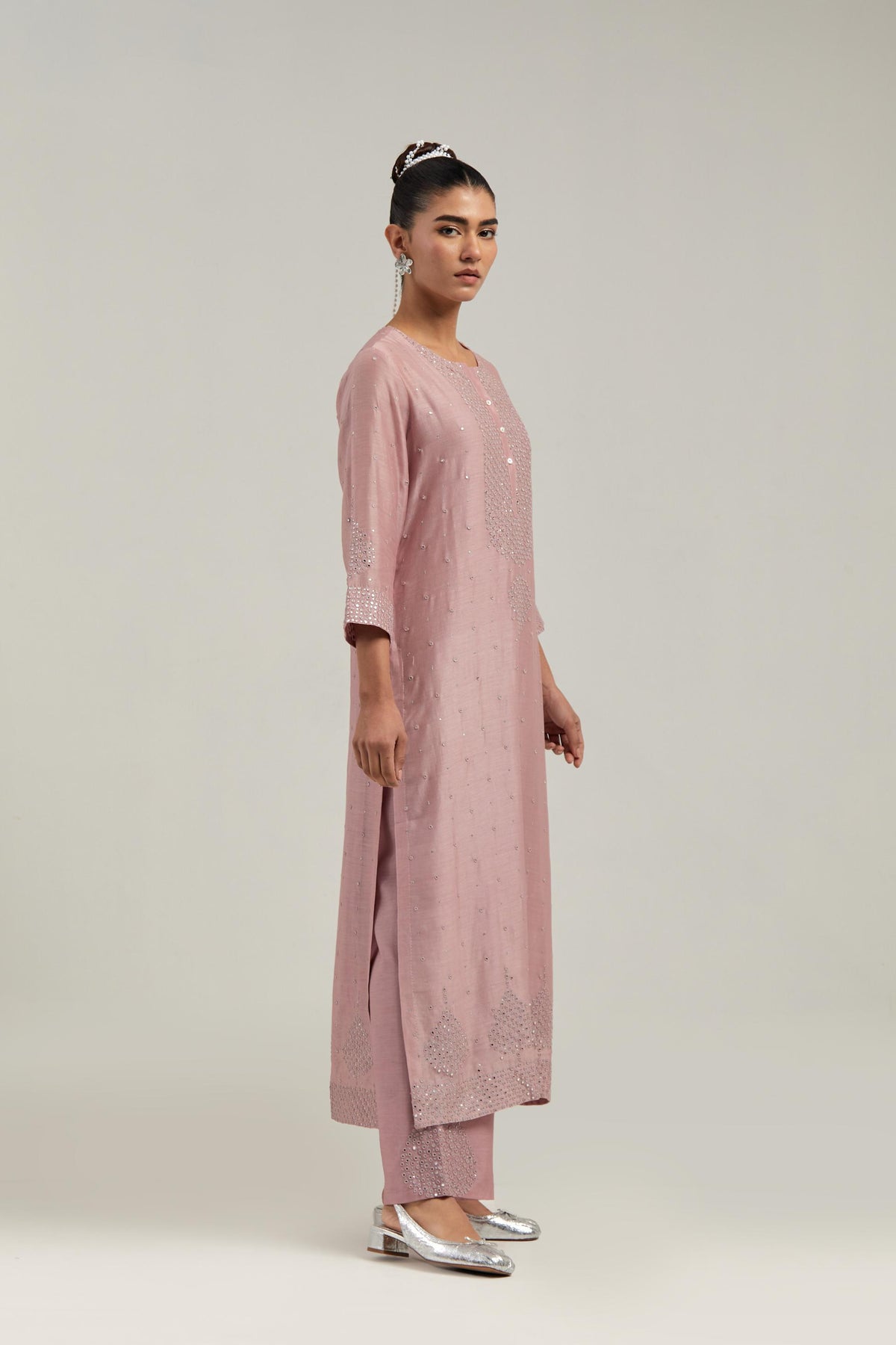 Pink silk Chanderi straight kurta set with hand-embroidered mirror at the neck, borders running along the hem and sleeve edges, and scattered silver sequin and mirror embellishments all-over.