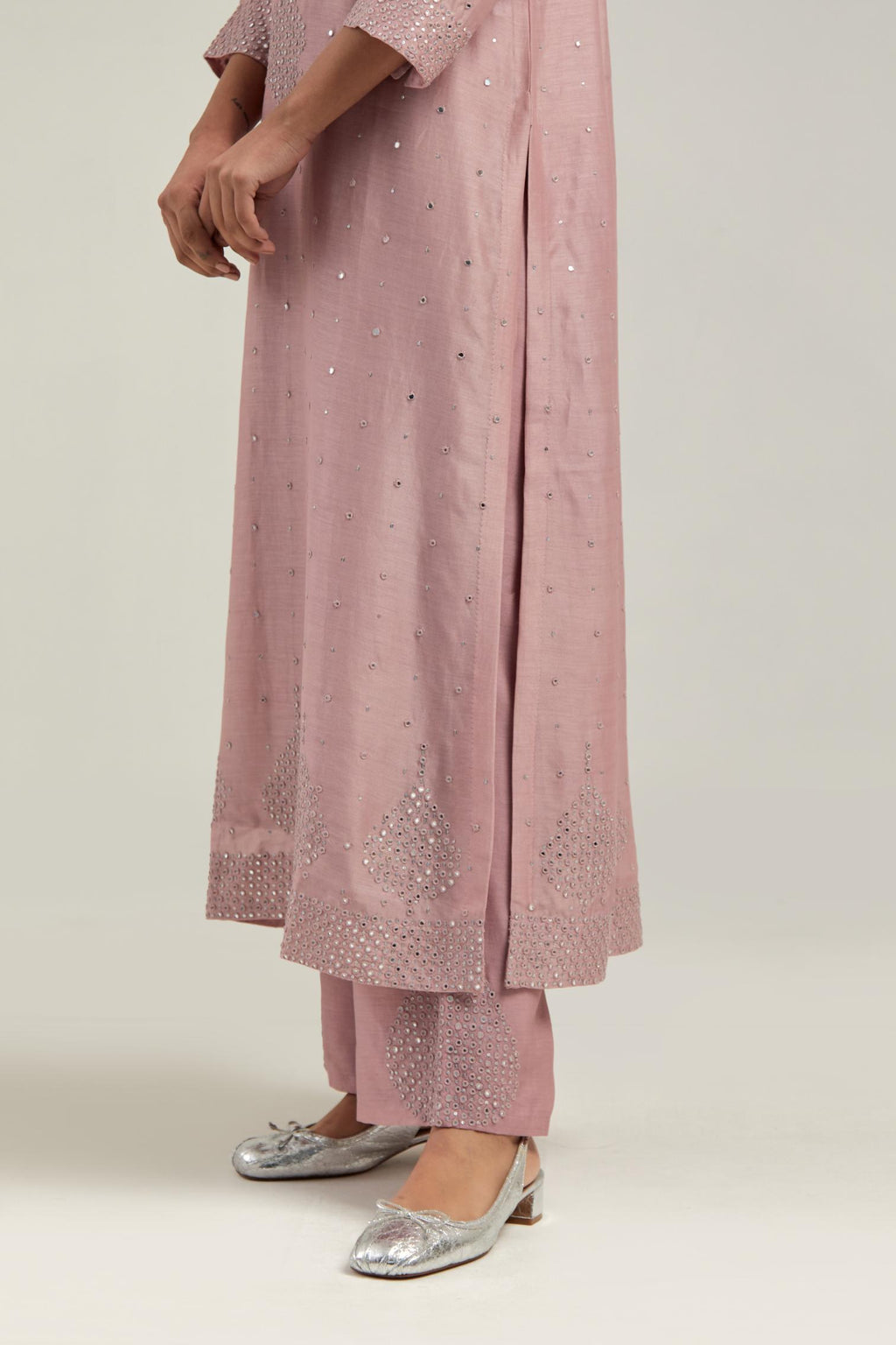 Pink silk Chanderi straight kurta set with hand-embroidered mirror at the neck, borders running along the hem and sleeve edges, and scattered silver sequin and mirror embellishments all-over.