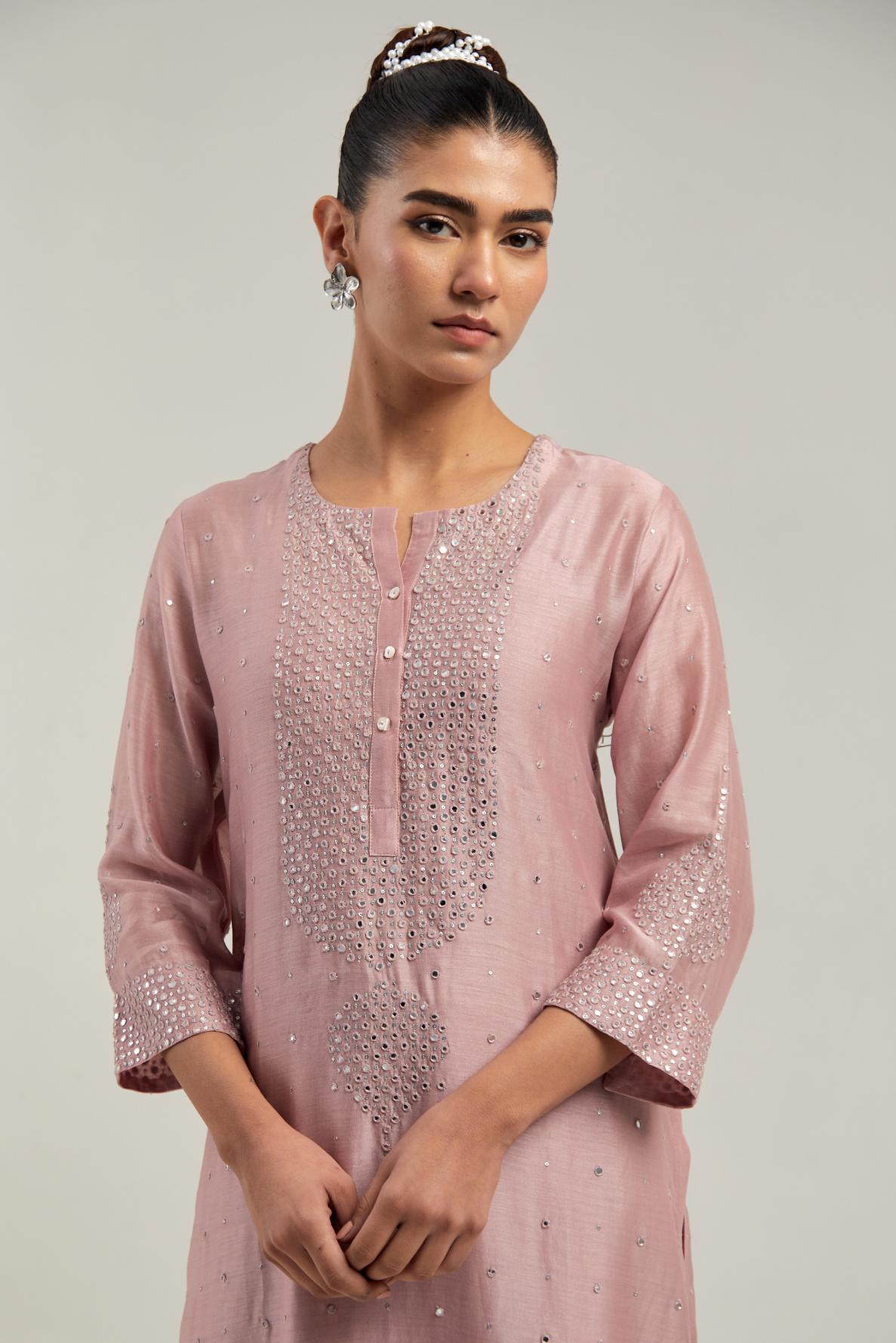 Pink silk Chanderi straight kurta set with hand-embroidered mirror at the neck, borders running along the hem and sleeve edges, and scattered silver sequin and mirror embellishments all-over.