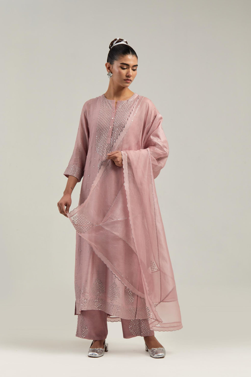 Pink silk Chanderi straight kurta set with hand-embroidered mirror at the neck, borders running along the hem and sleeve edges, and scattered silver sequin and mirror embellishments all-over.