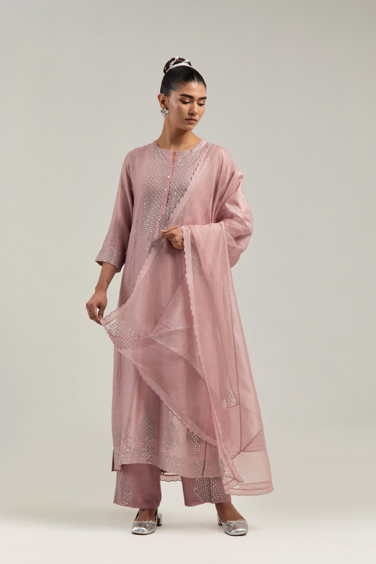 Pink silk Chanderi straight kurta set with hand-embroidered mirror at the neck, borders running along the hem and sleeve edges, and scattered silver sequin and mirror embellishments all-over.