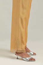 Yellow silk Chanderi straight pants with narrow organza scalloped hem and hand-embroidered diamond motifs with delicate mirror & sequins work at the sides.