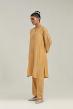 Yellow Silk Chanderi short kurta set with hand-embroidered paisley motifs with delicate mirror and sequins work all-over the kurta.