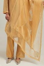 Yellow silk Chanderi dupatta with silk organza at the sides, finished with delicate scalloped edges, highlighted by hand-embroidered mirror & sequins work.