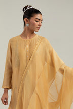 Yellow silk Chanderi dupatta with silk organza at the sides, finished with delicate scalloped edges, highlighted by hand-embroidered mirror & sequins work.