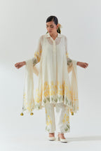 Off white cotton chanderi A-line short kurta set with yellow & green applique work at hem, highlighted with bead & sequins work.