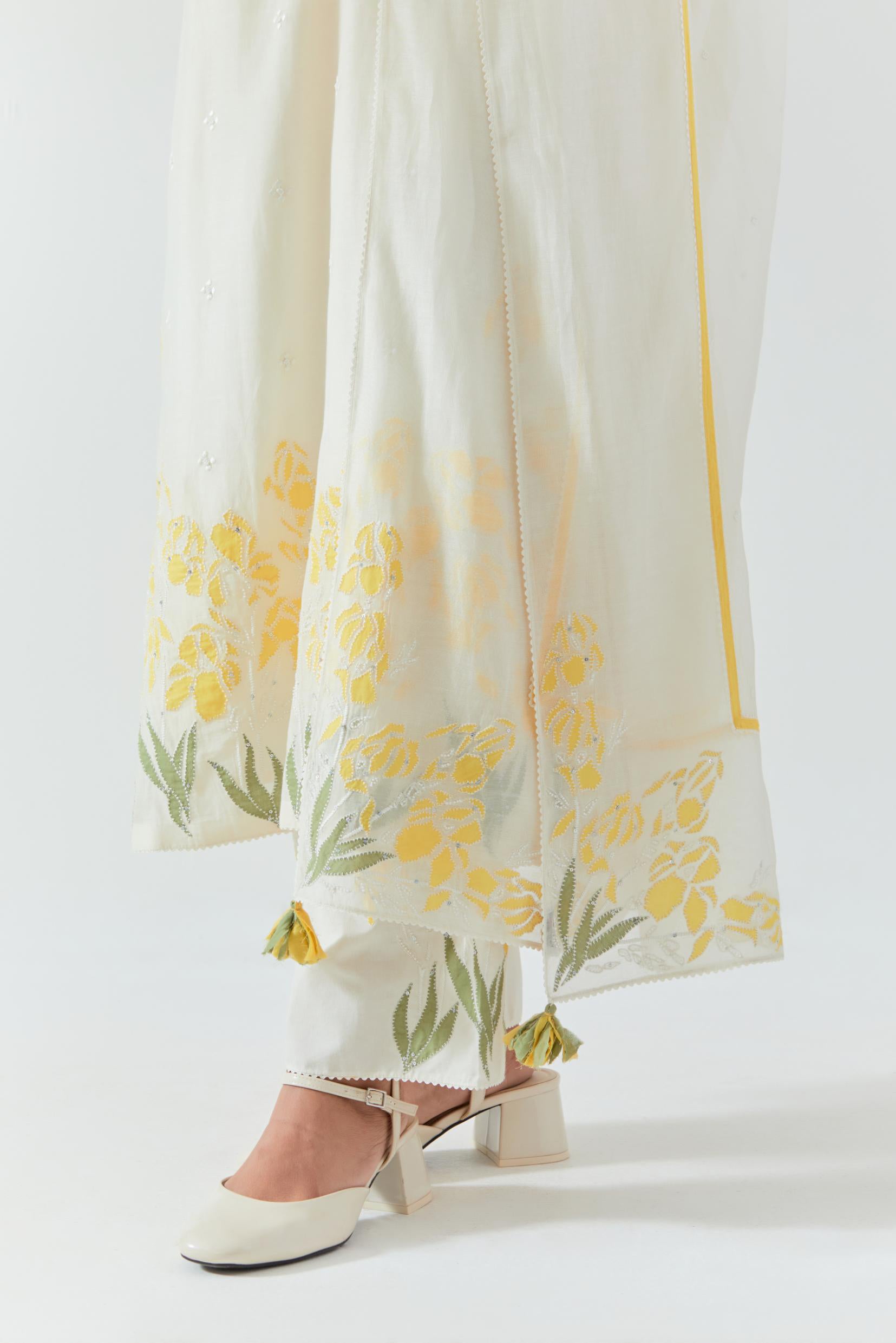 Off white cotton chanderi dupatta with yellow & green colored applique, highlighted with bead & sequins work.