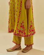 Yellow tissue chanderi paneled kurta set with front placket neckline and all-over hand cut silk flower embroidery.