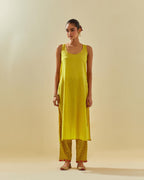 Yellow tissue chanderi paneled kurta set with front placket neckline and all-over hand cut silk flower embroidery.