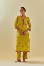 Yellow tissue chanderi straight kurta set, with contrast silk hand cut flowers embroidery, highlighted with gold sequins.