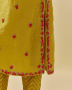 Yellow tissue chanderi straight kurta set, with contrast silk hand cut flowers embroidery, highlighted with gold sequins.