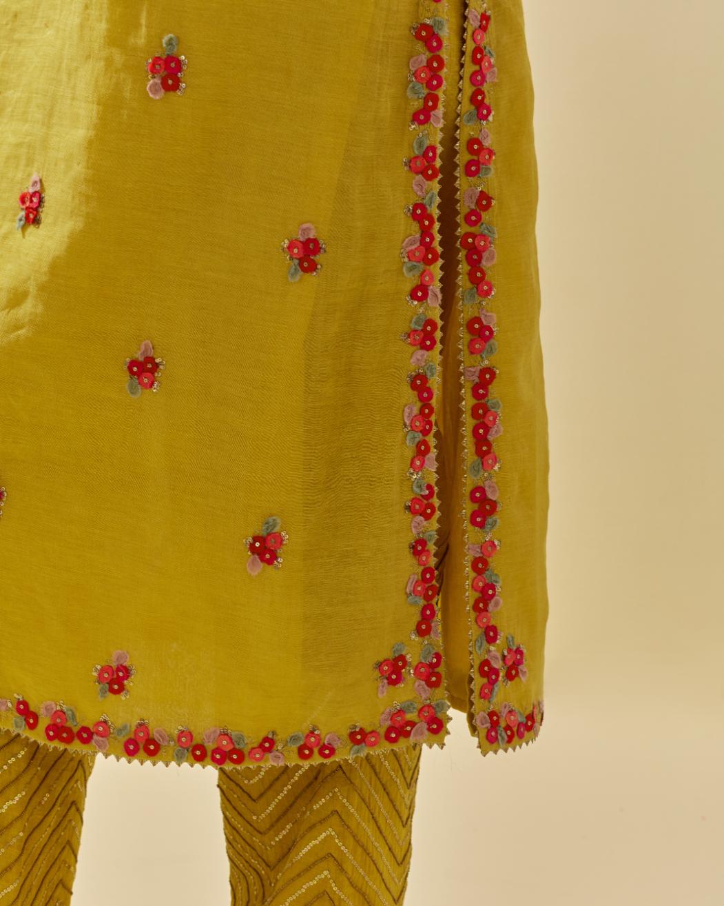 Yellow tissue chanderi straight kurta set, with contrast silk hand cut flowers embroidery, highlighted with gold sequins.