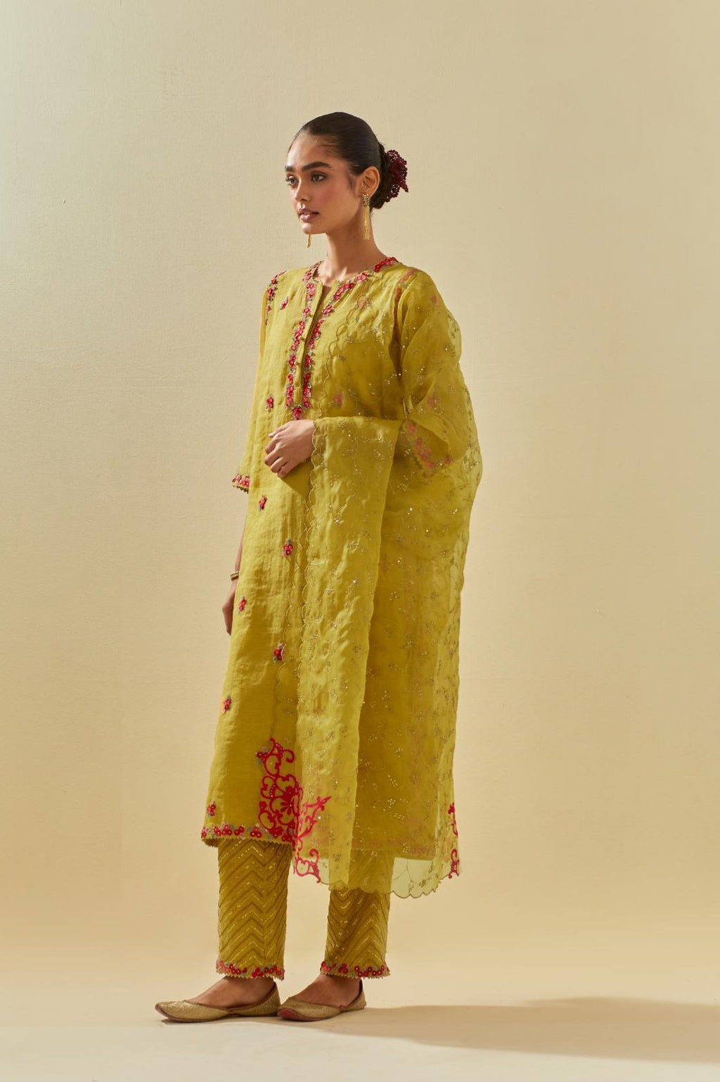 Yellow silk organza dupatta with all-over delicate gold zari embroidery & silk applique work, highlighted with gold sequins.