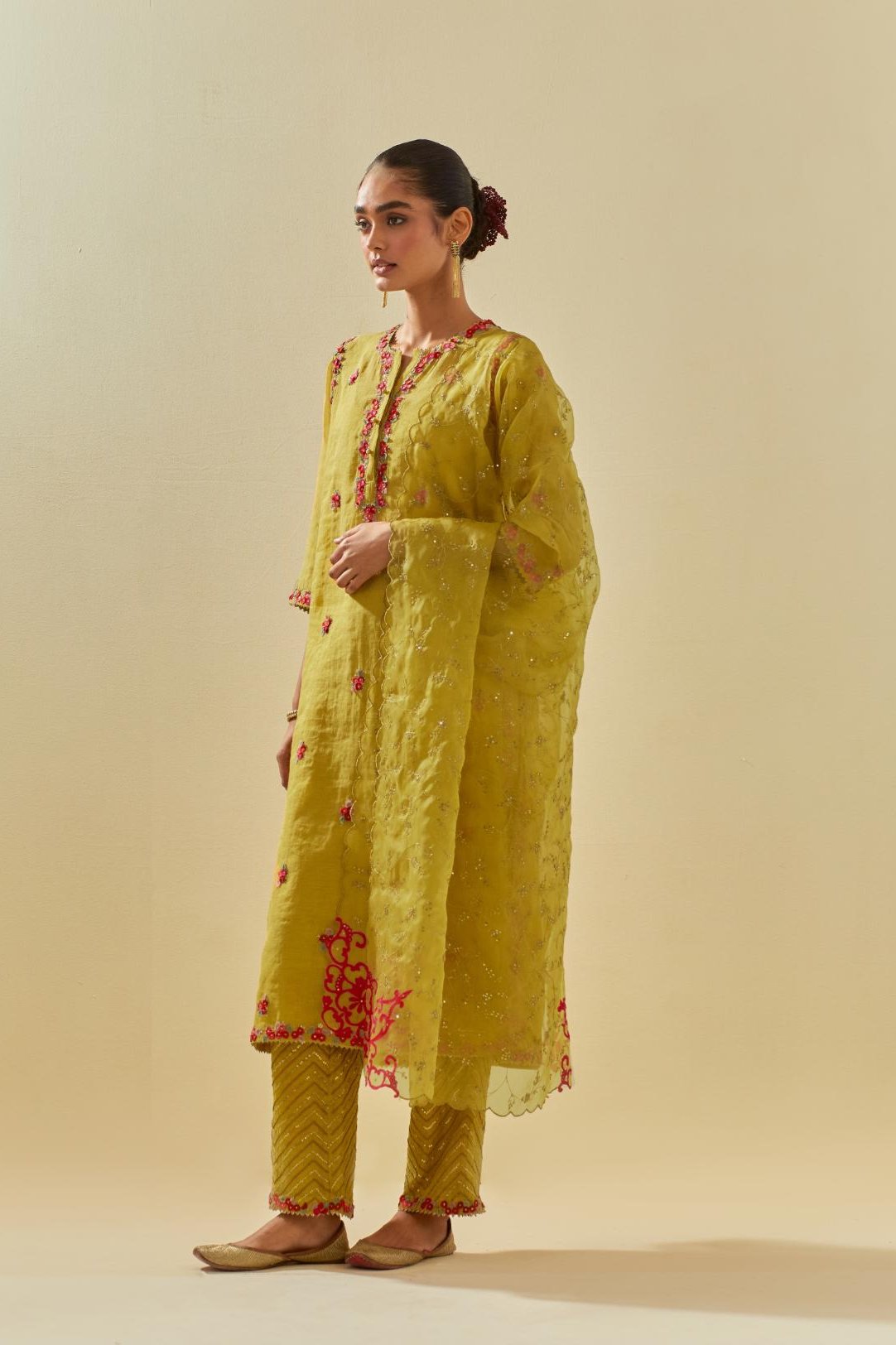 Yellow silk organza dupatta with all-over delicate gold zari embroidery & silk applique work, highlighted with gold sequins.